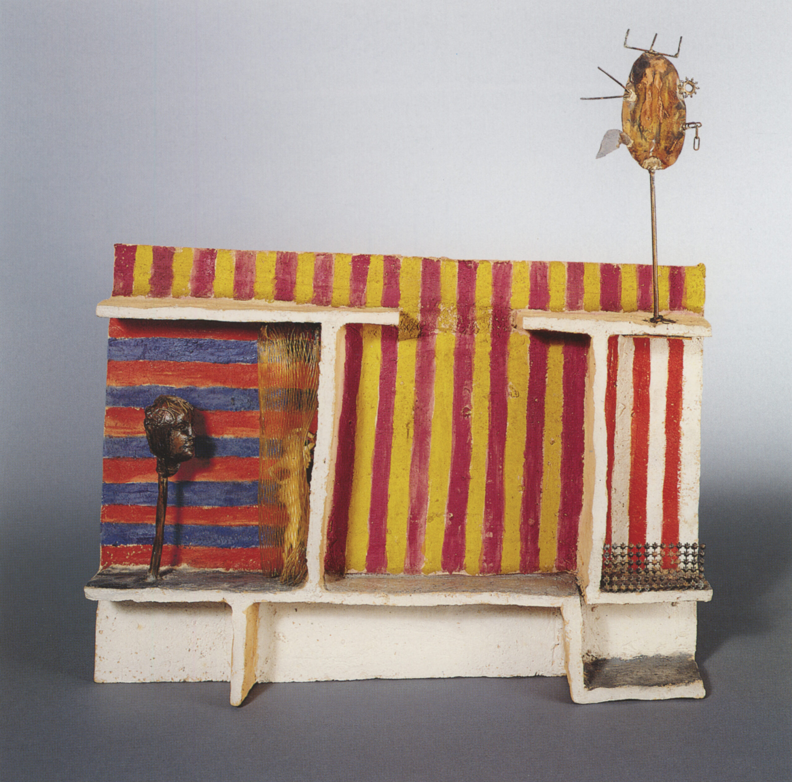 Fausto Melotti L'Africa, 1966 materiale refrattario dipinto e ingobbiato, bronzo, ottone, plastica 49,5 x 45 x 6,7 cm